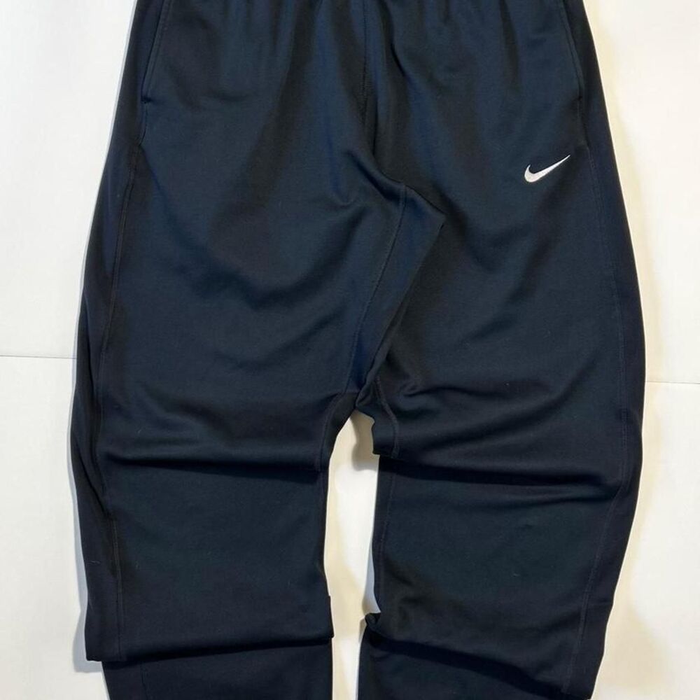 Nike Men's black baggy track pants with drawstring